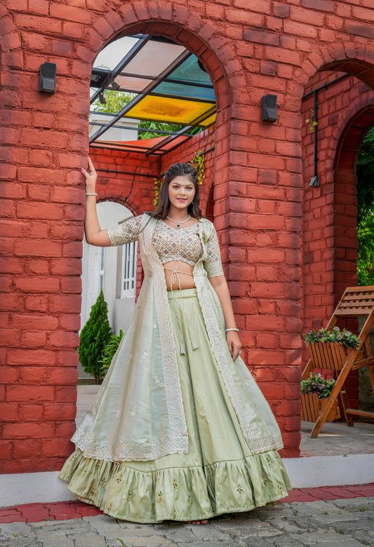 Mesmerizing  Heavy Embroidery Zari Pista Color Lehenga Choli