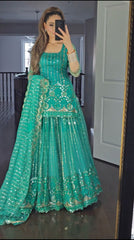 Captivating Sequence Work  Rama Color Lehenga With Top