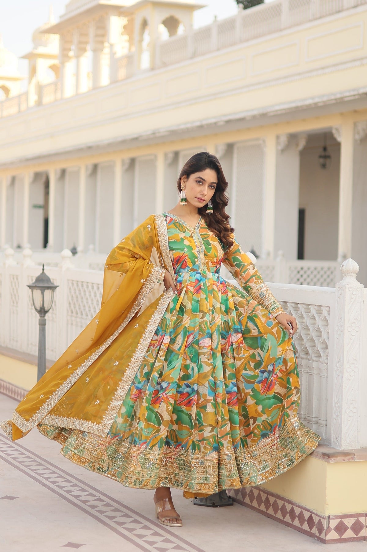 Captivating Embroidery Zari Sequins-work Yellow Color Gown