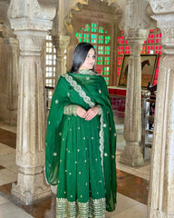 Captivating Embroidery Sequence Work Green Color Gown