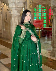 Captivating Embroidery Sequence Work Green Color Gown