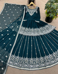 Luxuriant Embroidery Sequence Work Rama Color Top With Lehenga