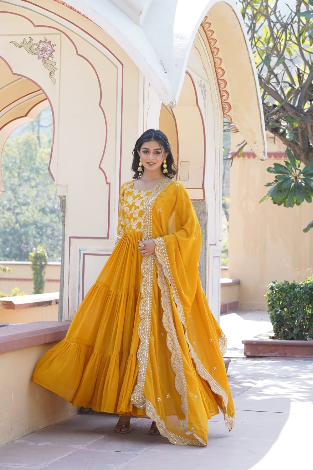 Festive Wear Yellow Color Jacquard Work Gown