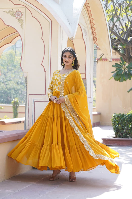 Festive Wear Yellow Color Jacquard Work Gown