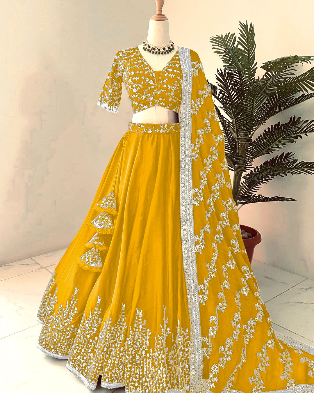 Captivating Embroidery Sequence Work Yellow Color Lehenga Choli