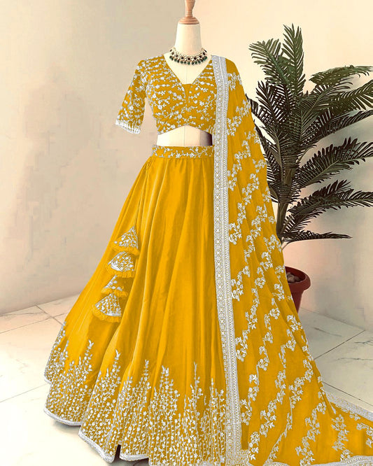 Captivating Embroidery Sequence Work Yellow Color Lehenga Choli