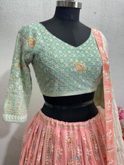 Outstanding Embroidery Work Pink Color Lehenga Choli