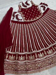 Presenting Embroidery Work Maroon Color Lehenga Choli