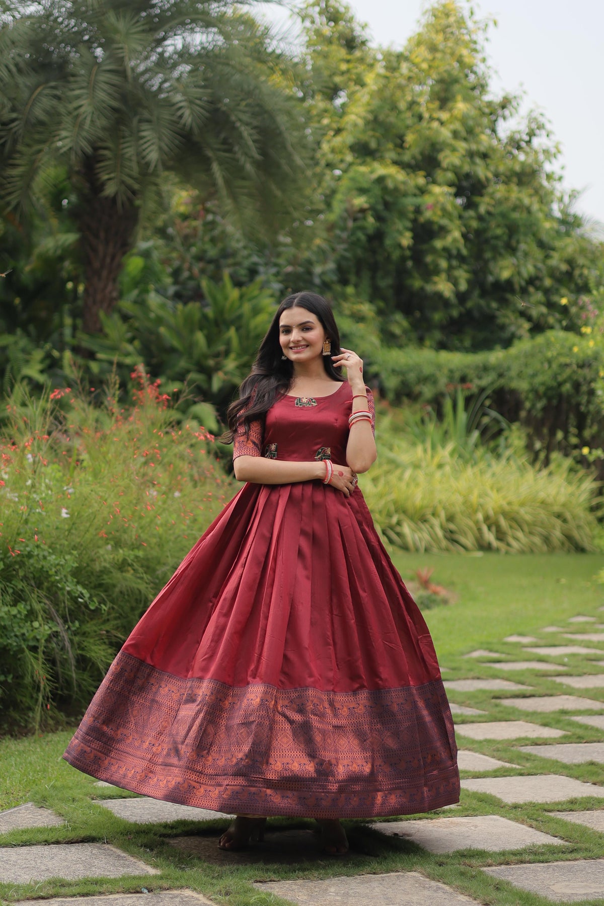 Festive Wear Maroon Color Jacquard Silk Gown