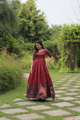 Festive Wear Maroon Color Jacquard Silk Gown