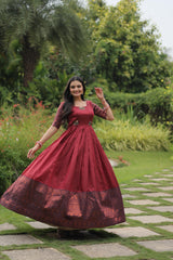 Festive Wear Maroon Color Jacquard Silk Gown