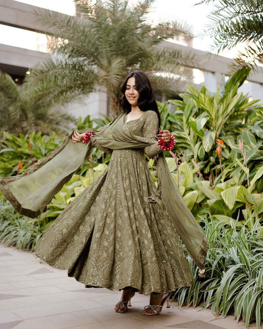 Pretty Sequence Embroidery Work Green Color Gown