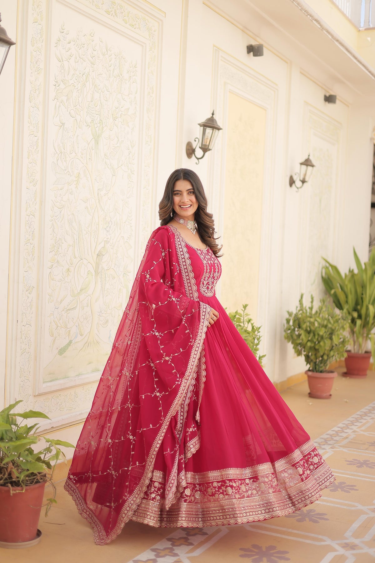 Fantastic Pink Color Embroidered Work Gown