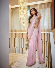 Marvelous Embroidery Work Peach Color Saree