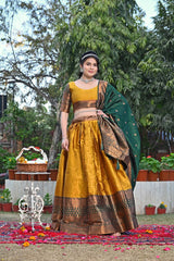 Glimmering Zari Weaving Work Yellow Color Lehenga Choli