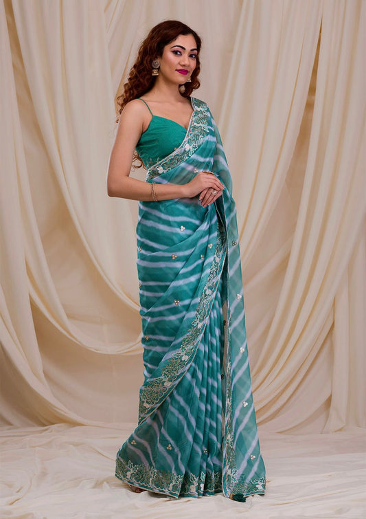 Outstanding Embroidery Work Rama Color Digital Print Saree