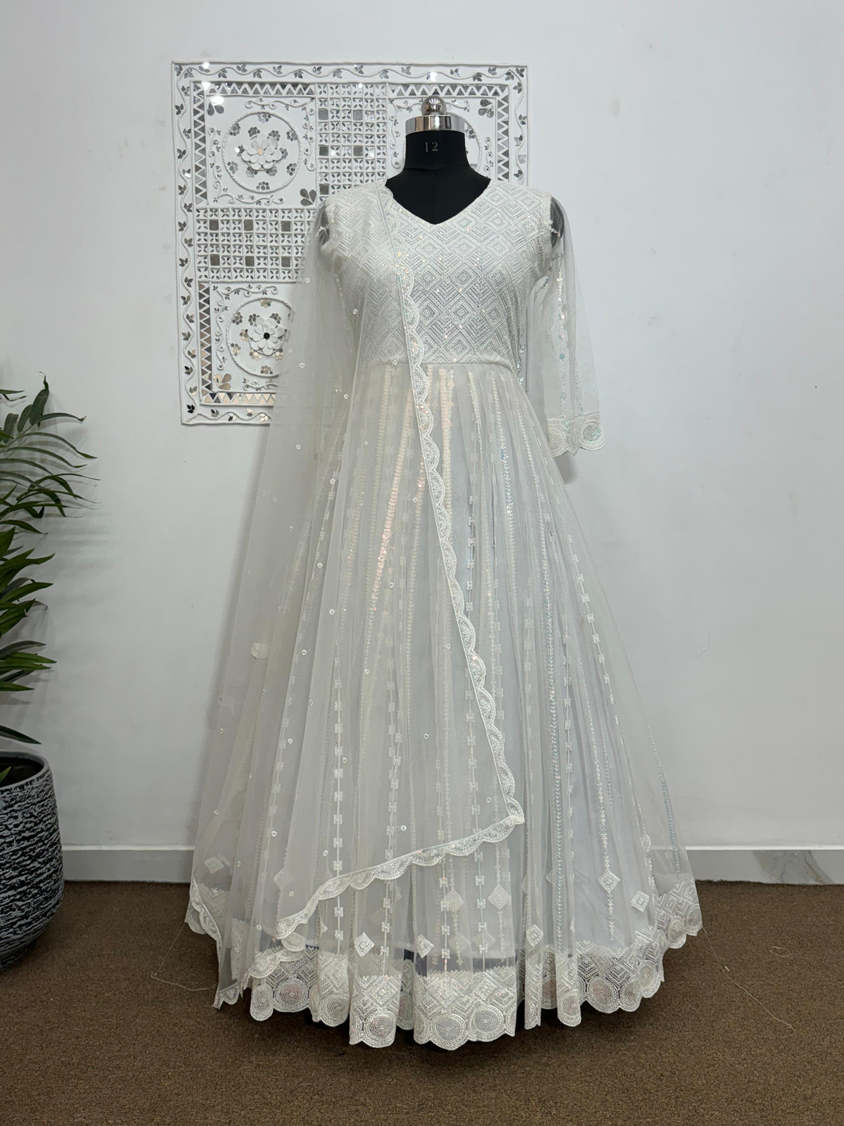 Mesmerizing Embroidery Thread Work White Color Gown