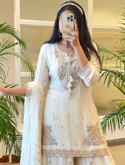 Demanding Embroidery Sequence Work White Color Sharara Suit