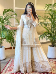 Demanding Embroidery Sequence Work White Color Sharara Suit