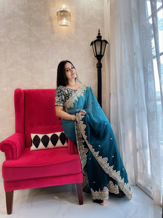 Wedding Wear Sky Blue Color Georgette Heavy Border Saree