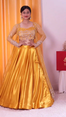 Delightful Orange Color Japan Satin Lehenga Choli With Koti