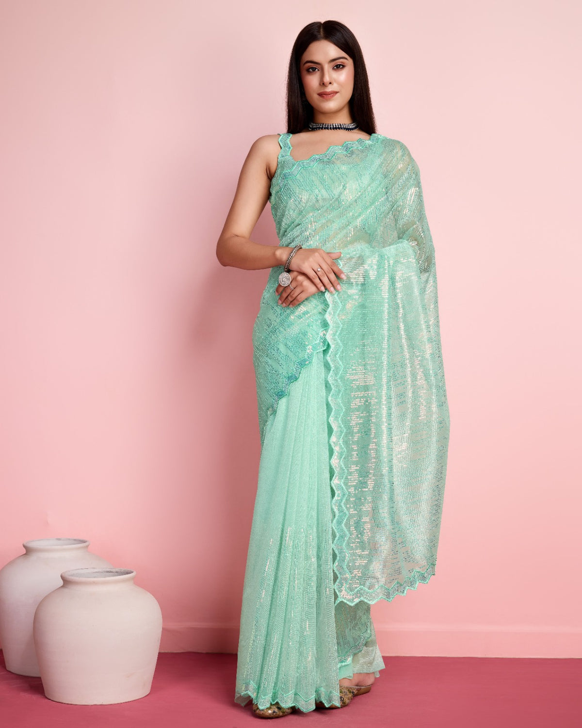 Glorious Aqua Blue Color Net Saree With Cut Work Border