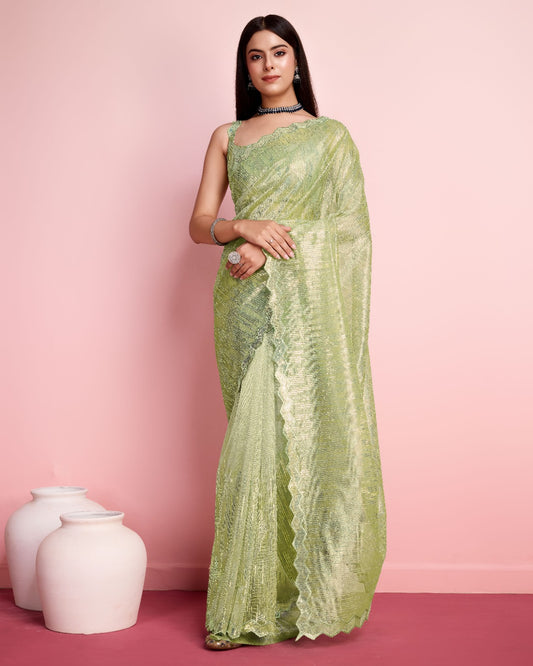 Glorious Pista Color Net Saree With Cut Work Border