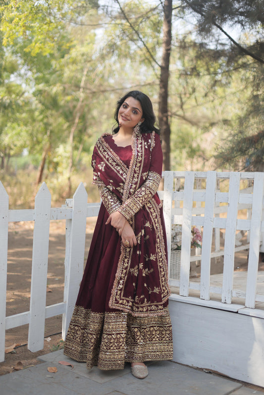 Blissful Vichitra Shimmer Embroidered Work Maroon Color Gown