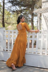 Shining Georgette Multi Thread Mustard Color Long Gown