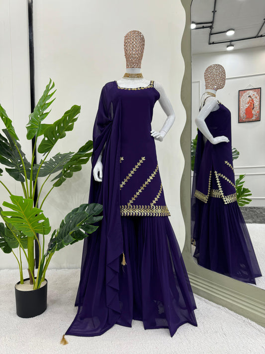 Imposing Georgette Purple Color Full Stitched Sharara Suit