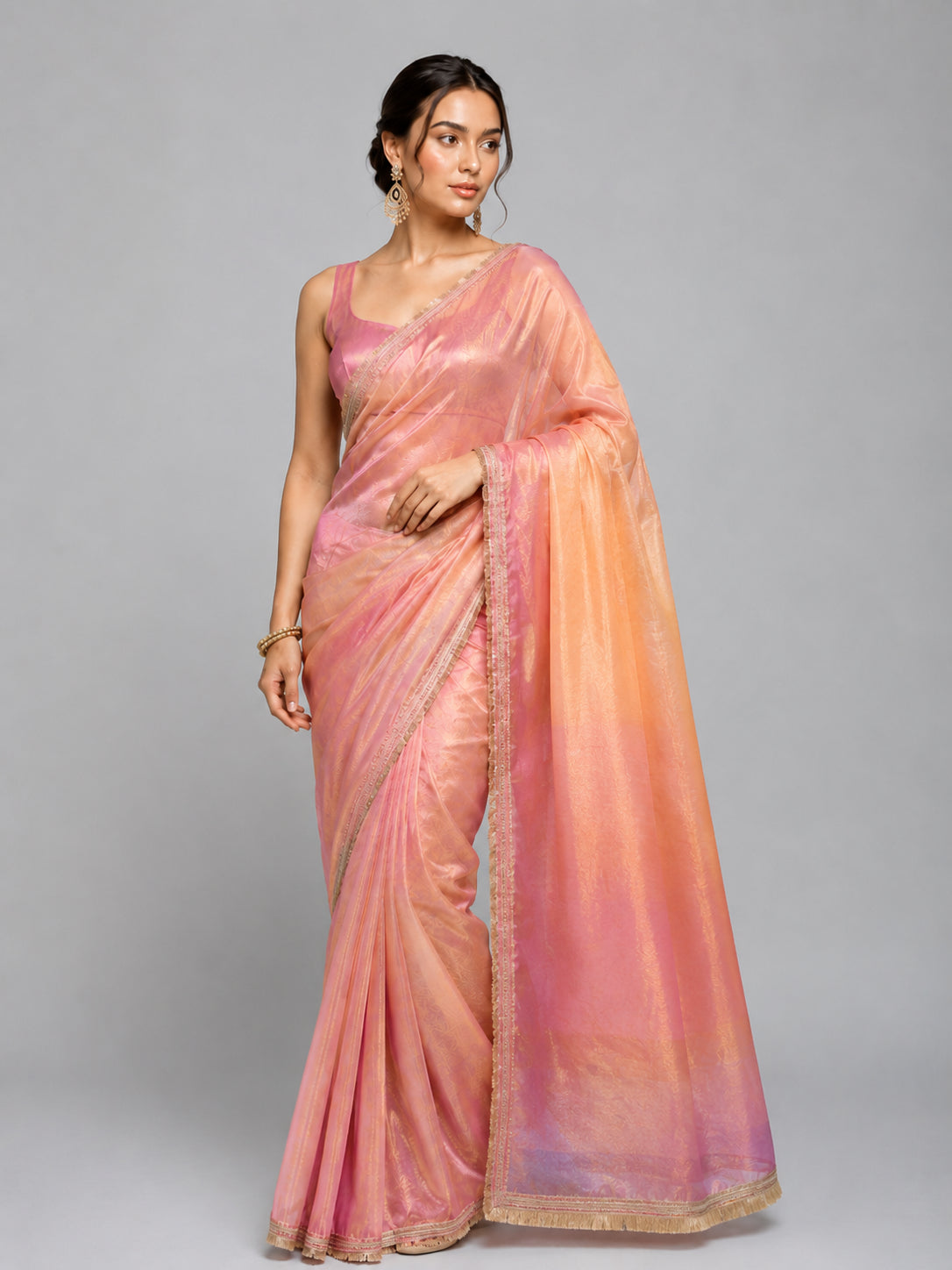 Peach Soft Tissue Silk with Fancy Lace Border Saree
