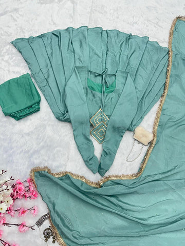 Fabulous Chinnon Silk Aqua Green Color Anarkali Gown