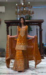 Fabulous Georgette Mustard Color Sharara Suit