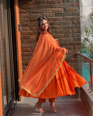 Fabulous Chinnon Silk Orange Color Anarkali Gown