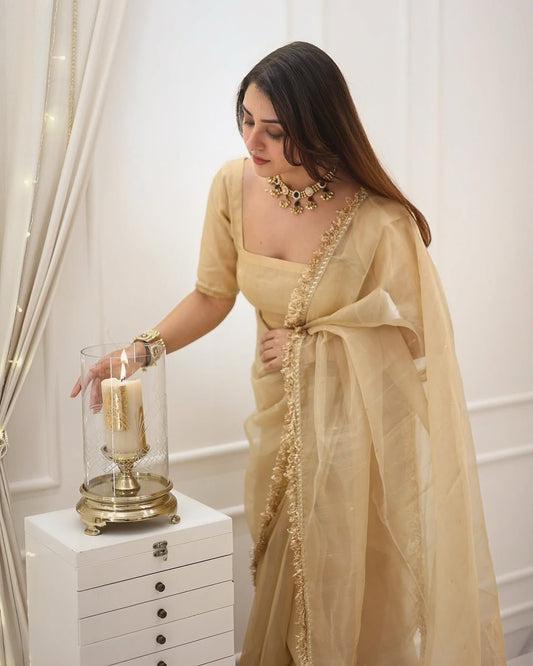Exclusive Goldy Crazy Cream Color Saree