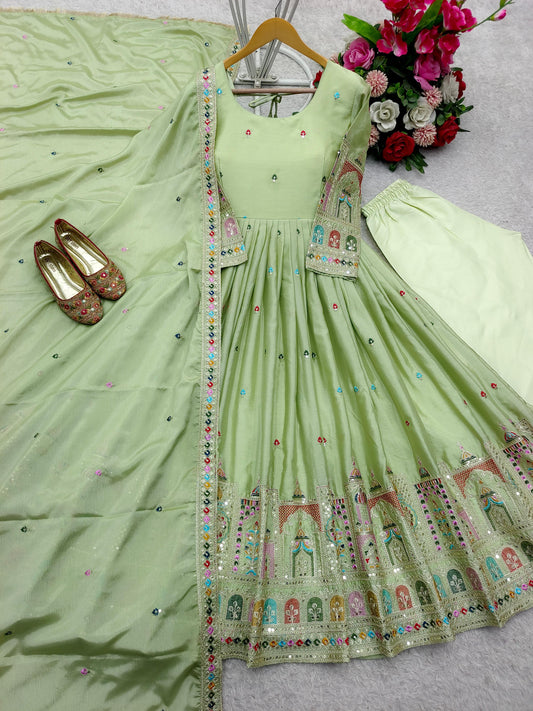 Stunning Embroidery Work Pista Color Anarkali Gown