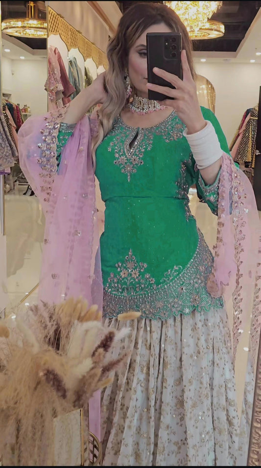 Outstanding Embroidery Work Green Color Top With Lehenga