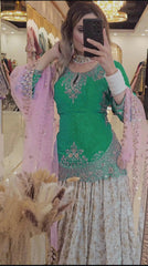 Outstanding Embroidery Work Green Color Top With Lehenga