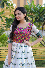 Precious White Color With Green Print Patola Silk Gown