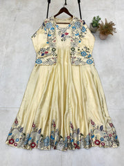 Flattering Sequence Embroidery Work Cream Color Gown With Koti
