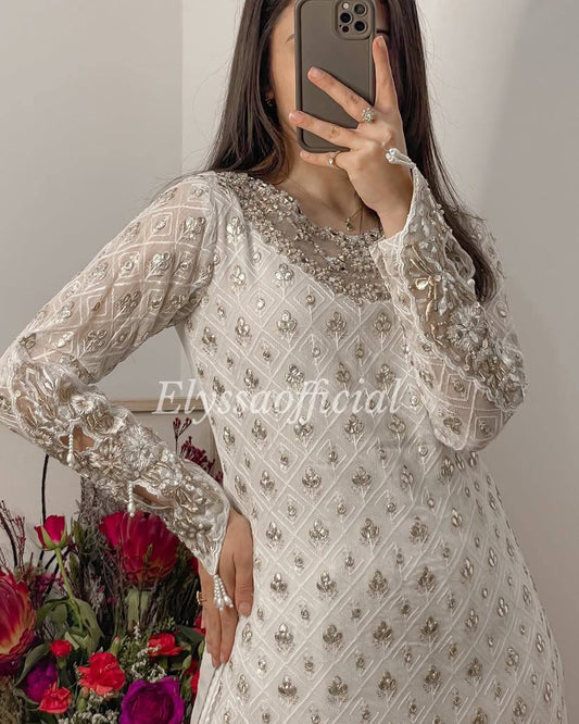 Decent Embroidery White Color Sharara Suit