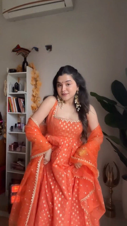 Peaceful Jequard  Weaveing Orange Color Gown