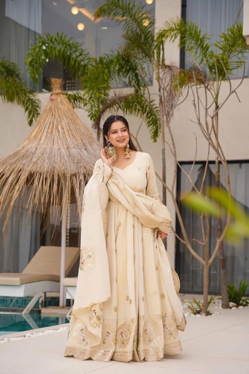 Eyes Catching Sequnce Work Cream Color Gown