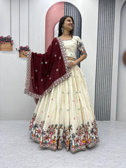 Heavy Work Cream Color Lehenga Choli With Maroon Dupatta