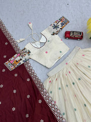 Heavy Work Cream Color Lehenga Choli With Maroon Dupatta