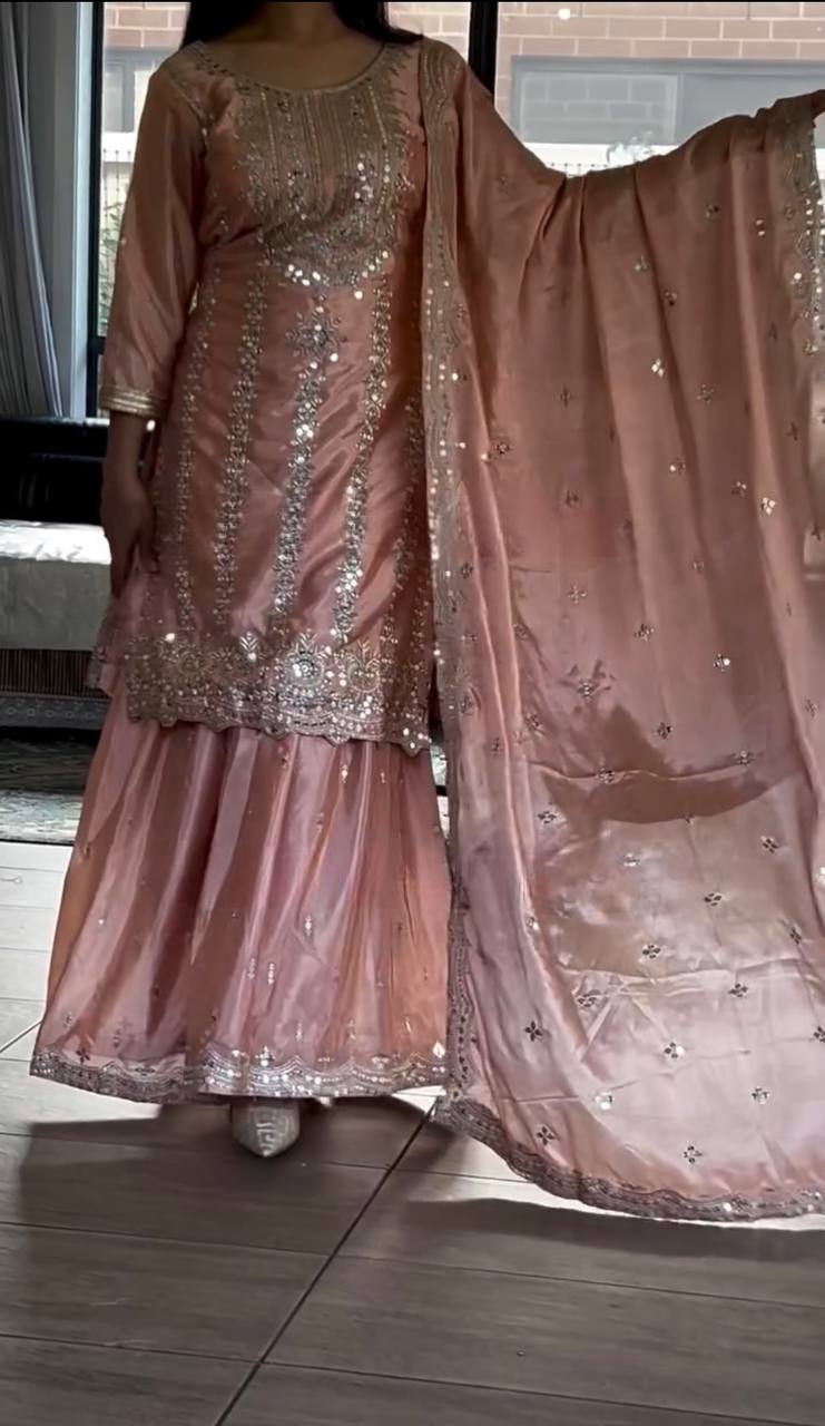 Delightful Embroidery Work Peach Color Sharara Suit