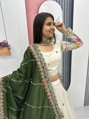 Function Wear Off White Color Lehenga Choli With Mehndi Dupatta