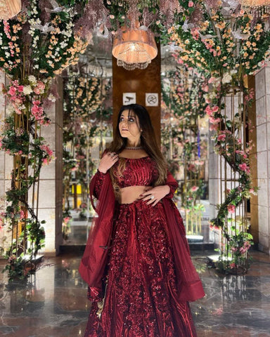 Beautiful Embellished Sequence Work Maroon Net Lehenga Choli
