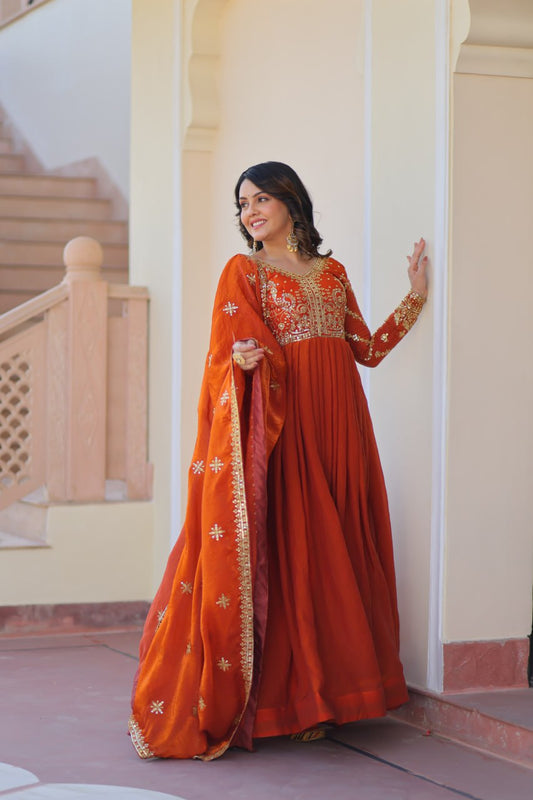 Delightful Embroidered Work Orange Color Gown