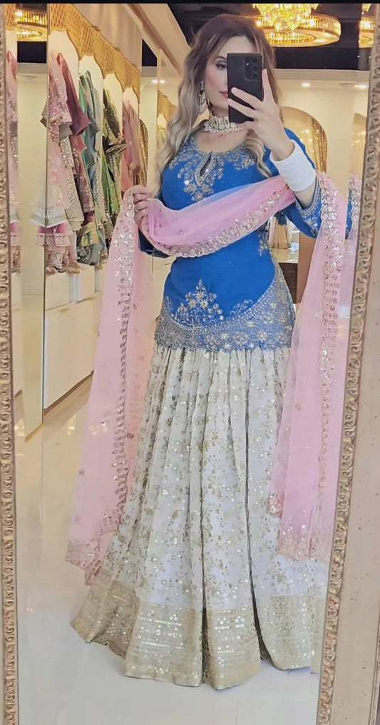Outstanding Embroidery Work Blue Color Top With Lehenga